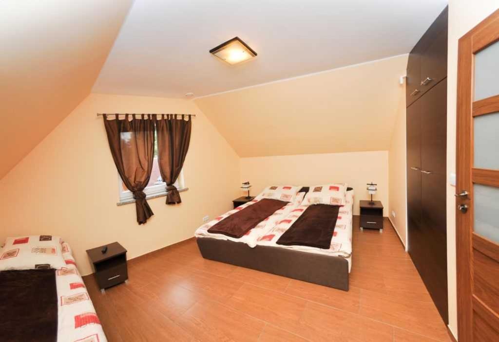Ferienhaus Holiday Home Domki RAJ Jarosławiec Eksteriør billede