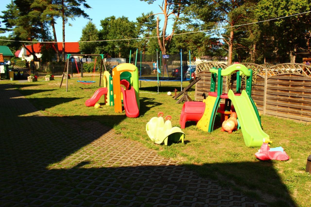 Ferienhaus Holiday Home Domki RAJ Jarosławiec Eksteriør billede
