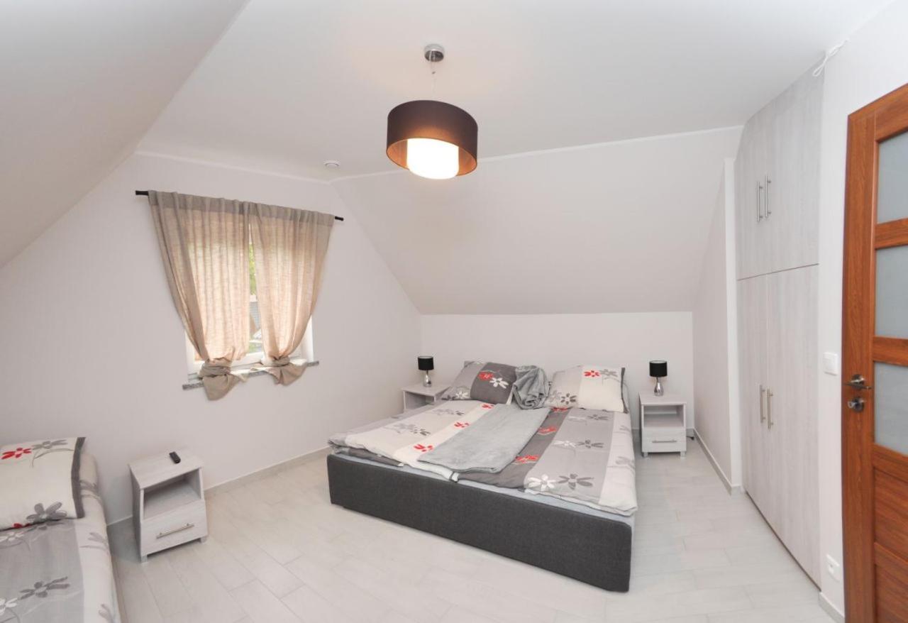 Ferienhaus Holiday Home Domki RAJ Jarosławiec Eksteriør billede