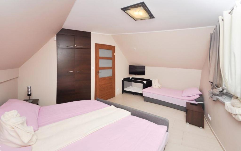 Ferienhaus Holiday Home Domki RAJ Jarosławiec Eksteriør billede