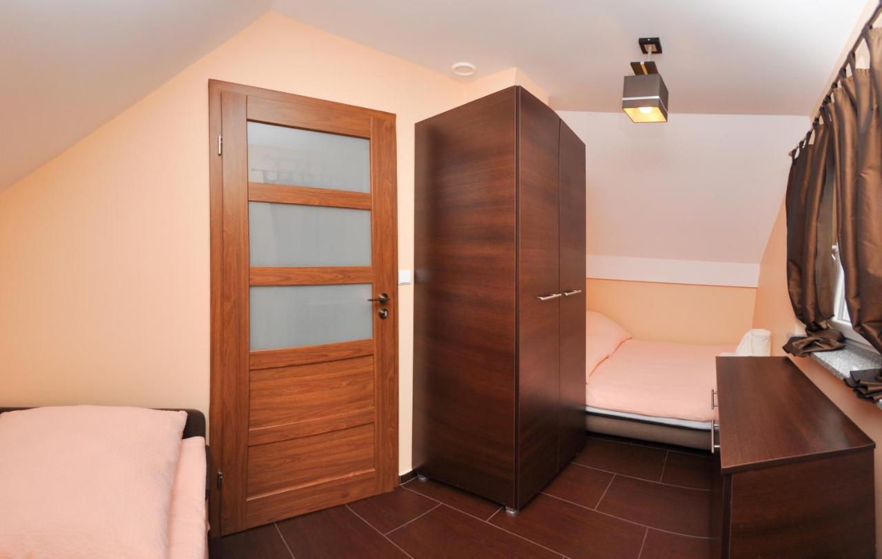 Ferienhaus Holiday Home Domki RAJ Jarosławiec Eksteriør billede