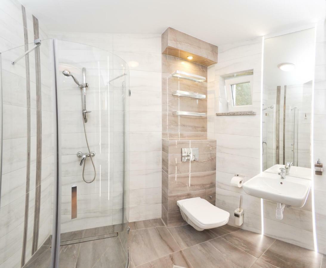 Ferienhaus Holiday Home Domki RAJ Jarosławiec Eksteriør billede