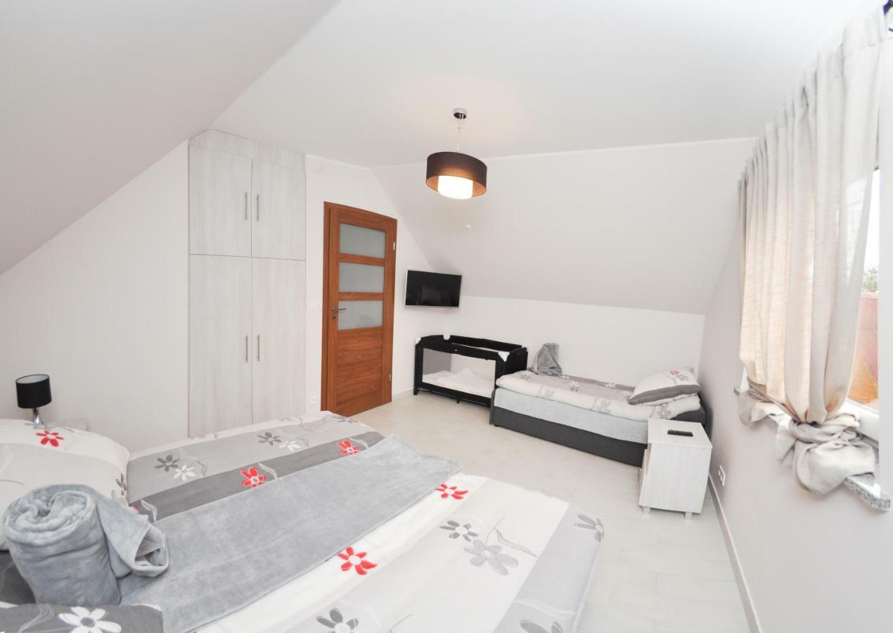 Ferienhaus Holiday Home Domki RAJ Jarosławiec Eksteriør billede