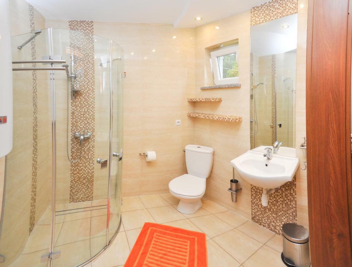 Ferienhaus Holiday Home Domki RAJ Jarosławiec Eksteriør billede