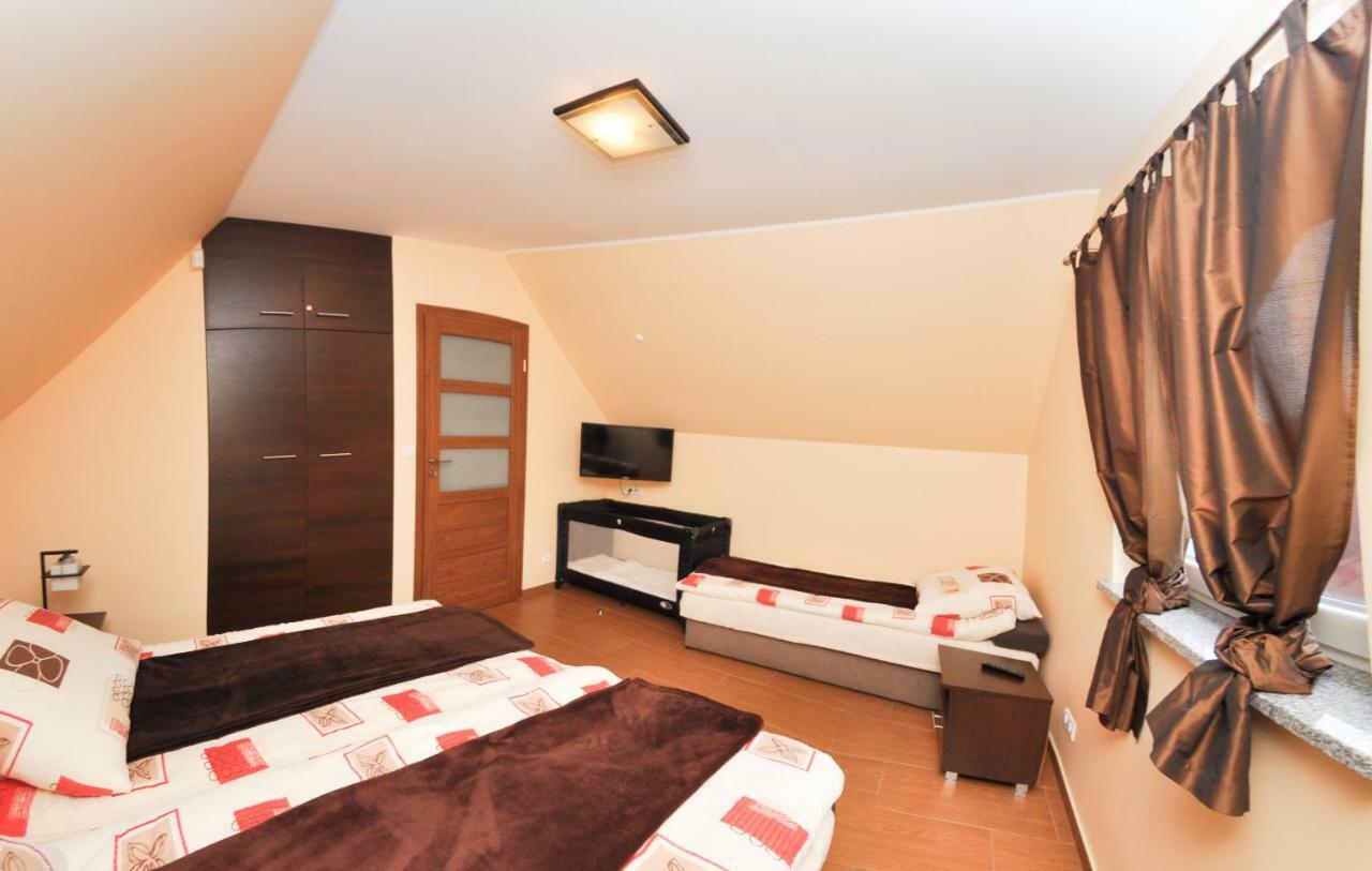 Ferienhaus Holiday Home Domki RAJ Jarosławiec Eksteriør billede